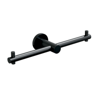 Metlam double toilet paper roll holder mounted on bathroom wall, featuring sleek design and chrome finish.