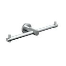Stainless steel Metlam double toilet paper roll holder mounted on bathroom wall, designed for easy access and durability.