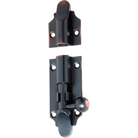 Tradco Victorian barrel bolt in black metal, showing a classic hardware lock for doors or windows.