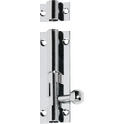 Tradco barrel bolt in black finish, mounted on wooden door for secure locking and easy manual operation.