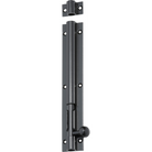 Tradco barrel bolt lock showing a metal latch with a black finish, mounted on a wooden door for security and privacy.