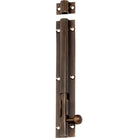 Tradco barrel bolt lock in black finish with mounting screws, ideal for securing doors and gates.