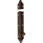 Tradco Victorian barrel bolt in brass with polished finish, mounted on a wooden door for secure latching.