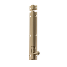 Tradco barrel bolt lock in black finish, mounted on a wooden door, showing its secure sliding mechanism and durable metal construction.