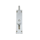 Zanda reverse barrel bolt in black, installed on door for secure locking, showing sleek metal finish and mounting hardware.