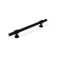 Momo BELGRAVIA knurled cabinet pull handle in matte black finish, shown on a wooden cabinet door.
