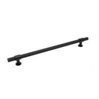 Momo Belgravia knurled appliance pull handle in matte black finish, mounted on a cabinet door, showcasing textured grip design.