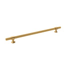 Momo BELGRAVIA lined cabinet pull handle in brushed brass finish, mounted on a cabinet door.
