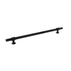Momo Belgravia lined cabinet pull handle in brushed metal finish mounted on a wooden cabinet door.