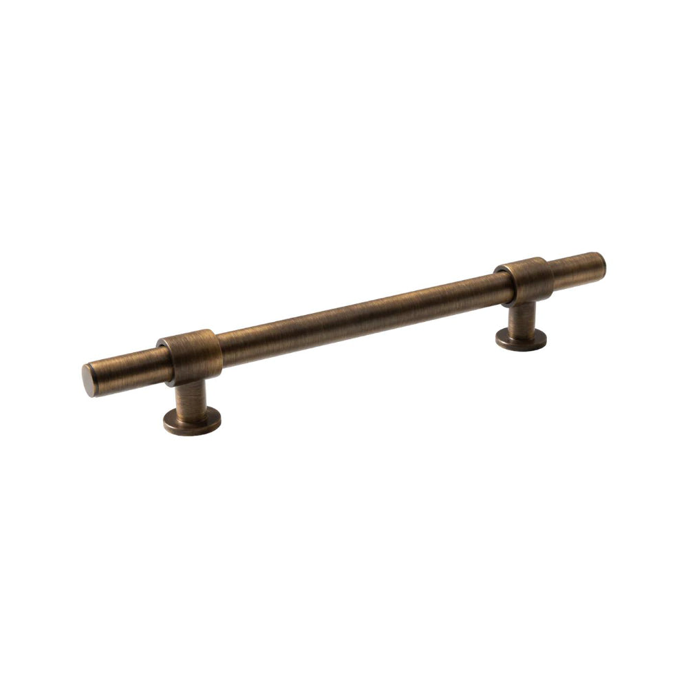 Momo BELGRAVIA plain cabinet pull handle in bronze finish, mounted on a cabinet door, showcasing sleek modern design.