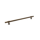 Momo BELGRAVIA plain cabinet pull handle in dark bronze finish mounted on a wooden cabinet door.