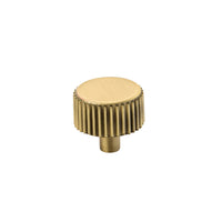 Momo BARRINGTON Cabinet Knob in brushed bronze finish mounted on a wooden cabinet door.