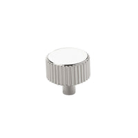 Momo Barrington cabinet knob in polished nickel finish, round handle with smooth surface, mounted on a wooden cabinet door.