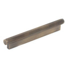 Momo Brighton cabinet pull handle in dark bronze finish with sleek, modern design mounted on a cabinet door.