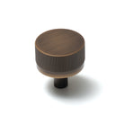 Momo Bellevue lined cabinet knob with brass finish, featuring a sleek, modern design for kitchen or furniture drawers.