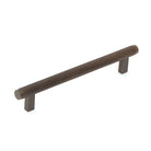 Momo BELLEVUE knurled cabinet pull handle with textured silver finish mounted on a cabinet door