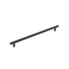 Momo Bellevue knurled cabinet pull handle with textured finish, mounted on a cabinet door for a modern and stylish look.