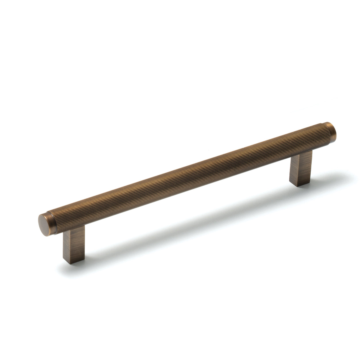 Momo Bellevue lined cabinet pull handle in bronze finish, showing a close-up view of the stylish, curved hardware for furniture drawers.