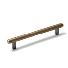 Momo Bellevue lined cabinet pull handle in dark bronze finish, featuring a sleek, modern design for kitchen or furniture drawers.