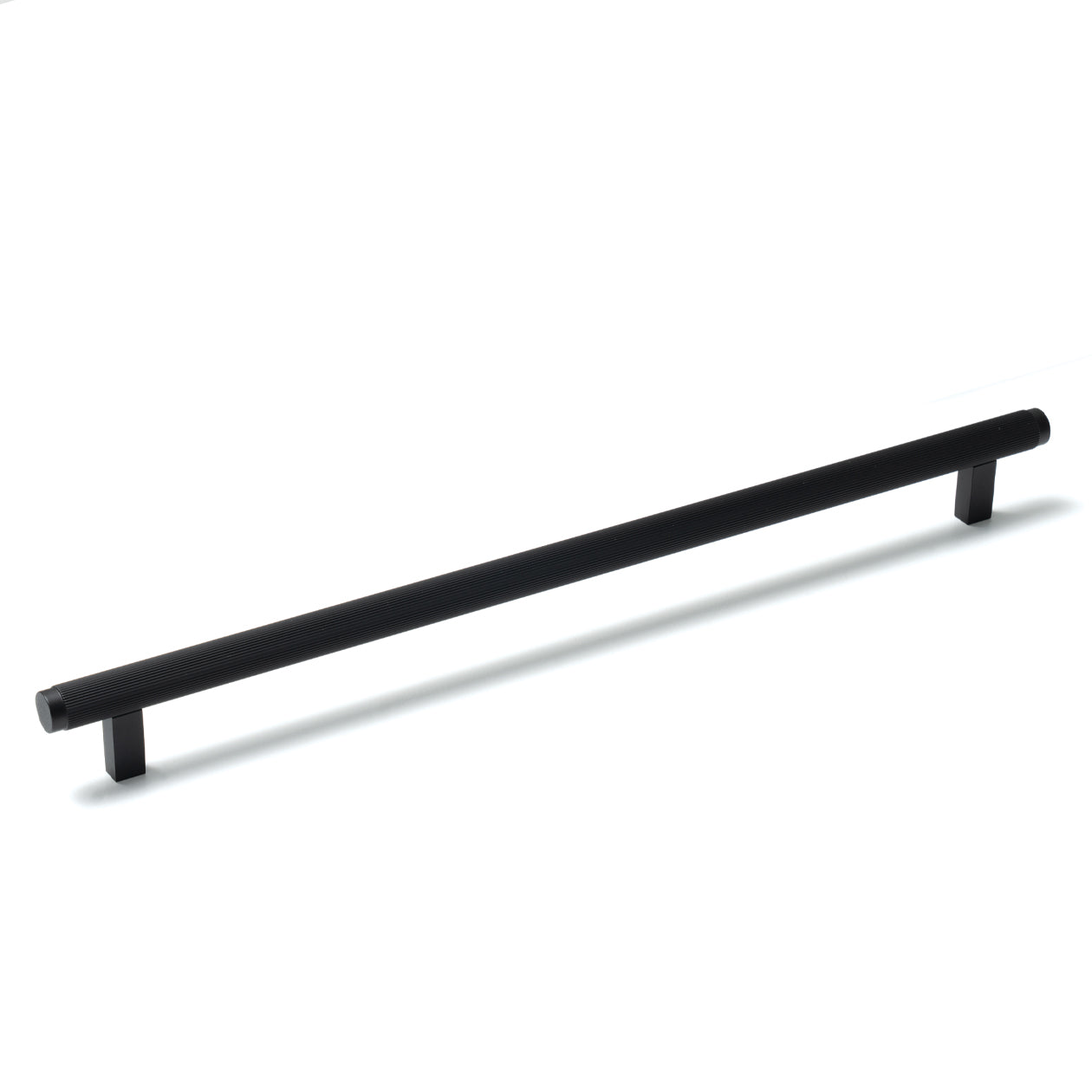 Momo BELLEVUE lined cabinet pull handle in brushed metal finish mounted on a cabinet door.