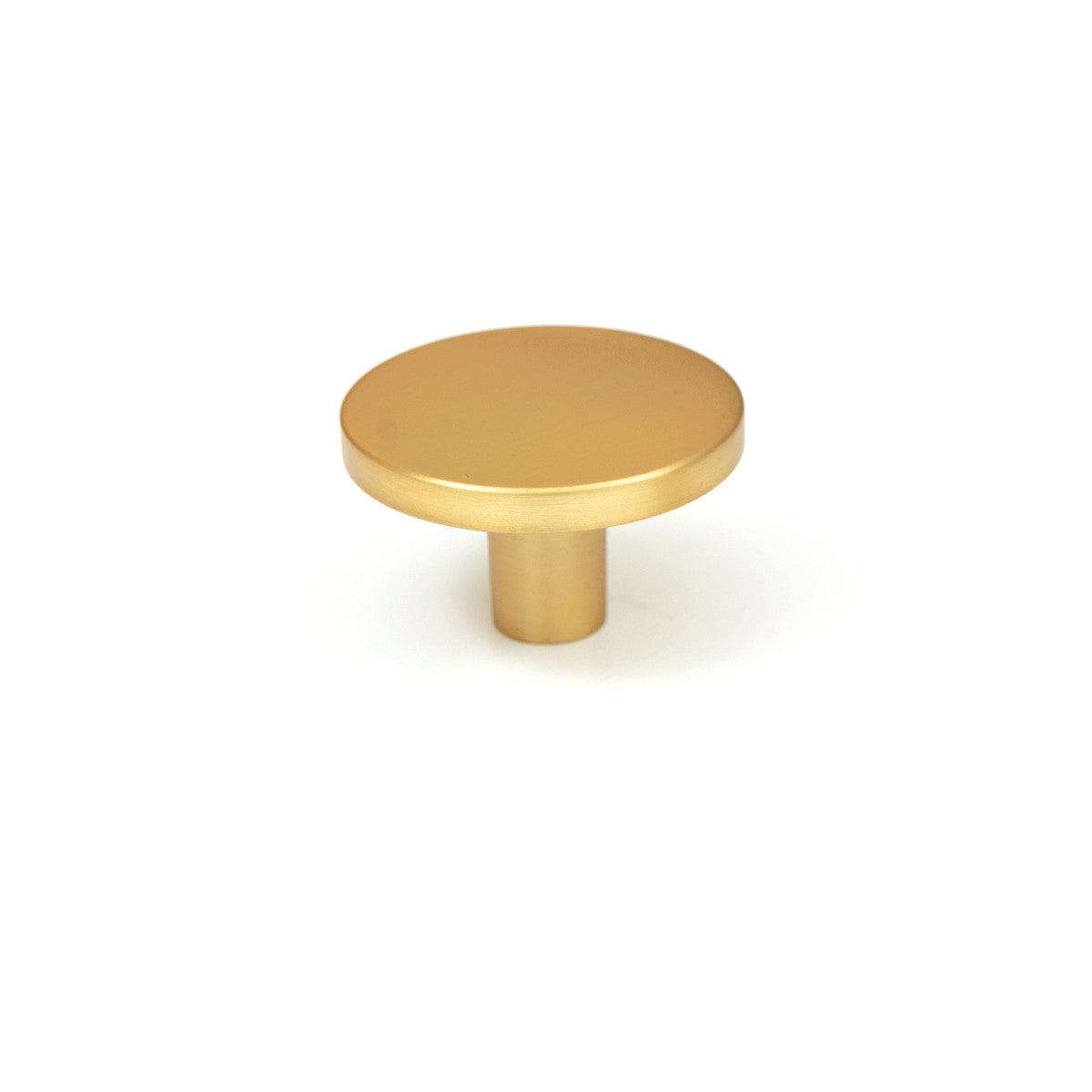 Momo COMO cabinet knob in bronze finish with a sleek, modern design, attached to a wooden cabinet door.