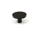 Momo COMO cabinet knob in matte black finish with a sleek, modern design and round shape, suitable for kitchen or furniture hardware.