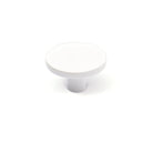 Momo COMO cabinet knob in white ceramic with a sleek, modern design and polished metal accent.