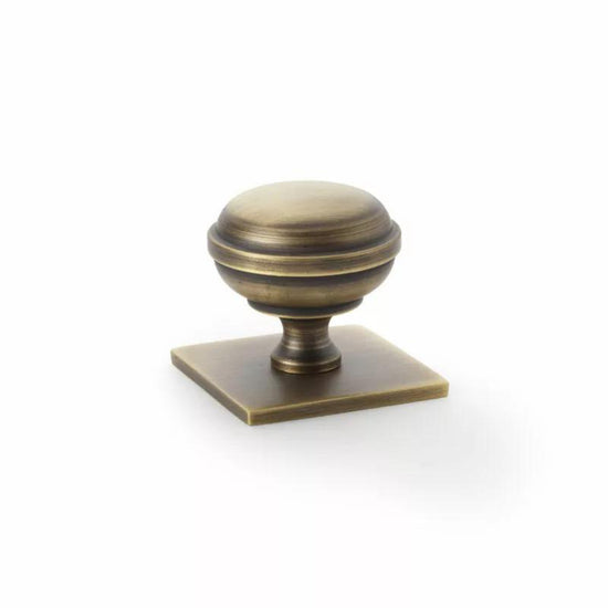 Hastings 34mm Knob on Backplate in Aged Brass