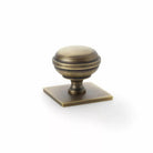 Hastings 34mm Knob on Backplate in Aged Brass