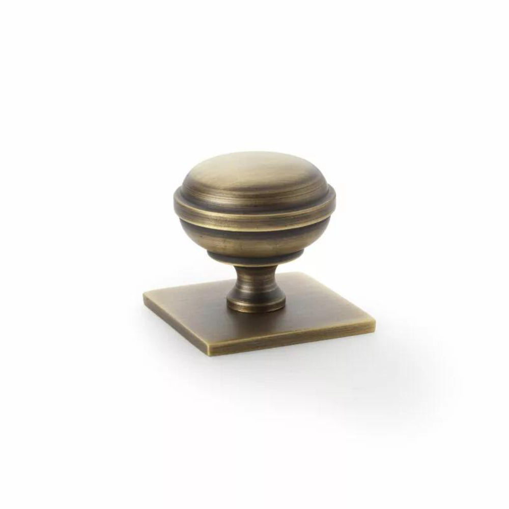 Hastings 34mm Knob on Backplate in Aged Brass