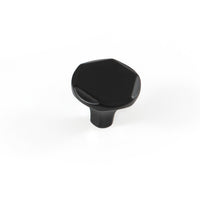 Momo CASELLE cabinet knob in matte black finish, round metal handle for kitchen or furniture drawer doors.