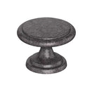 Kethy DK1357 cabinet knob in antique brass finish with a rounded design, mounted on a wooden cabinet door.