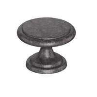 Kethy DK1357 cabinet knob in antique brass finish with a rounded design, mounted on a wooden cabinet door.