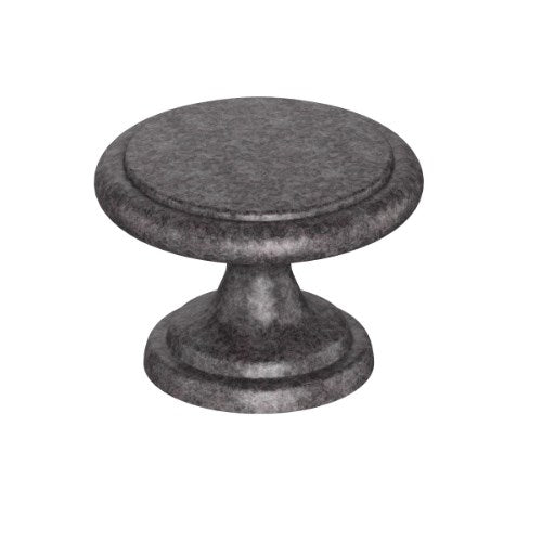 Kethy DK1357 cabinet knob in antique brass finish with a rounded design, mounted on a wooden cabinet door.
