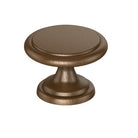 Kethy DK1357 Cabinet Knob in bronze finish mounted on a wooden cabinet door, showcasing its sleek modern design.