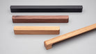 Kethy Timber Degree Handle L7810 with a natural wood finish, featuring a sleek, modern design perfect for cabinetry or furniture.
