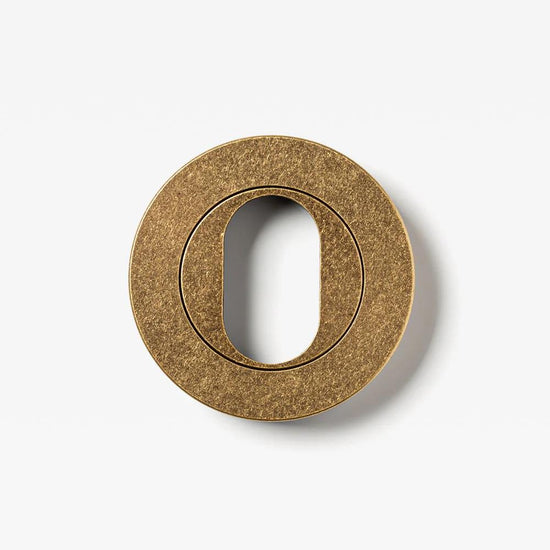 Escutcheon Oval Tumbled Brass 55mm Set in Tumbled Brass
