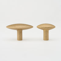 Almond Knob Tumbled Brass in Tumbled Brass