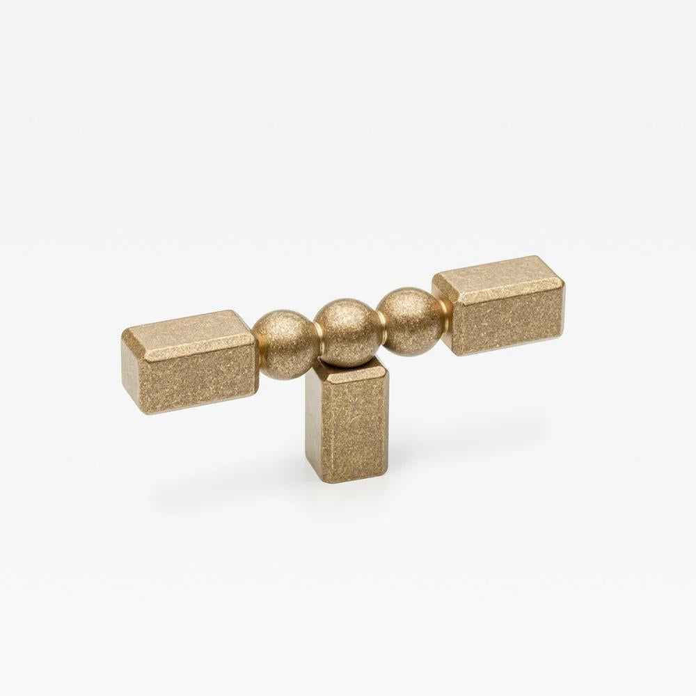 Small Lo & Co ORBE Cabinet T-Pull handle in brushed titanium finish, designed for modern kitchen and furniture cabinets.