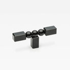 Small Lo & Co ORBE Cabinet T-Pull handle in brushed nickel, showing its sleek, modern design mounted on a cabinet door.