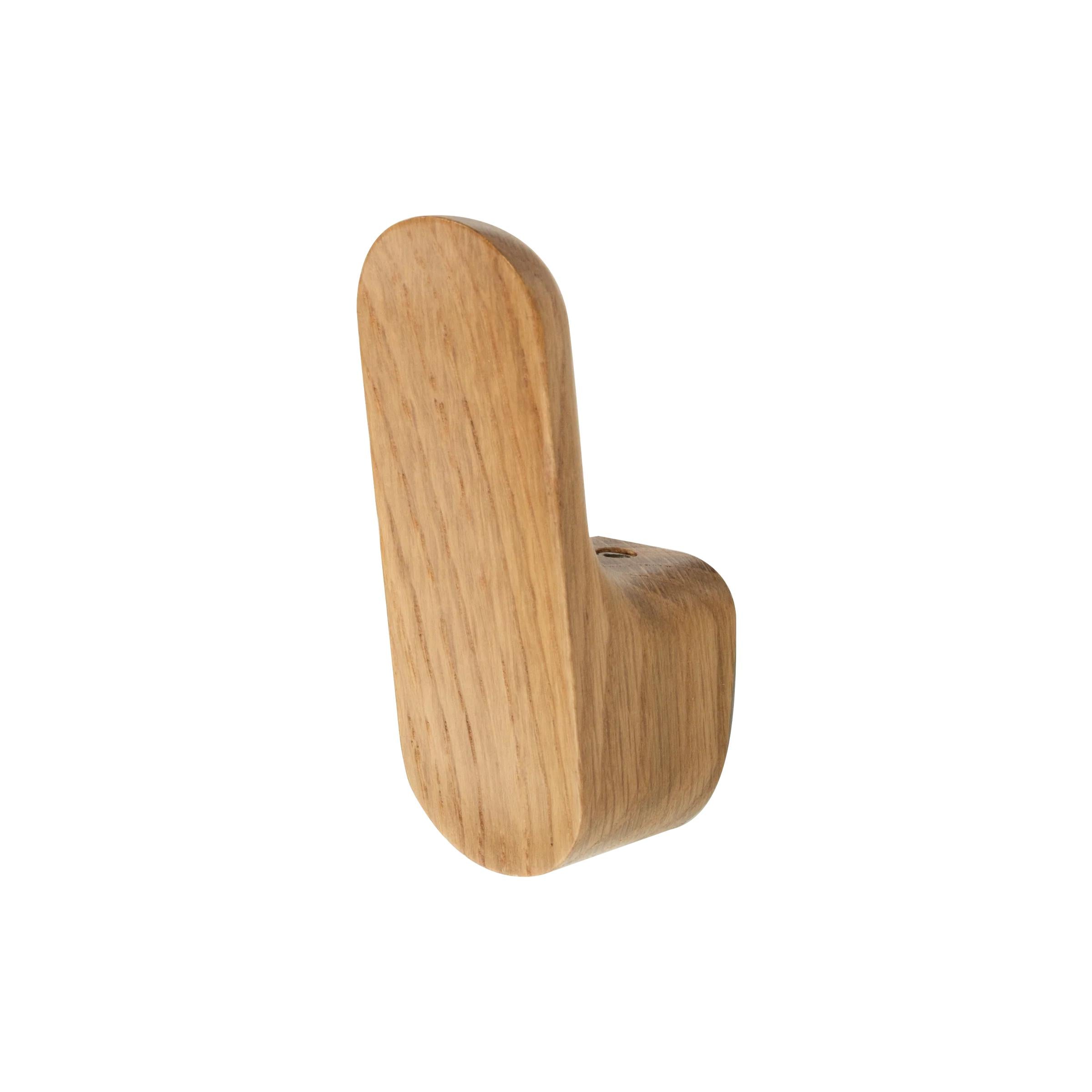 Momo LUV Timber Wall Hook in oak wood with a natural finish, mounted on a wall for hanging items.