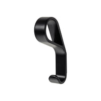Momo Belt Wall Hook mounted on a wall, showcasing its sleek design and sturdy metal construction for hanging belts and accessories.