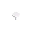 Momo Porto cabinet knob in white ceramic with a rounded design, mounted on a wooden cabinet door.