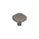 Momo Porto cabinet knob in glossy grey finish with rounded design, mounted on a wooden cabinet door.