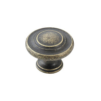 Momo FLORENCIA concentric cabinet knob with brass finish, featuring a sleek, round design for modern furniture drawers and doors.