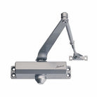 Gainsborough 3003ABC fire-rated door closer, silver finish, with arm and mounting hardware for commercial fire doors.