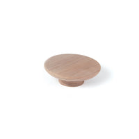 Momo Daintree Timber Full Round Cabinet Pull Handle mounted on wood cabinet, showcasing natural wood finish and rounded design.