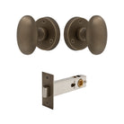 Knob Oval Rose - Passage in Roman Brass