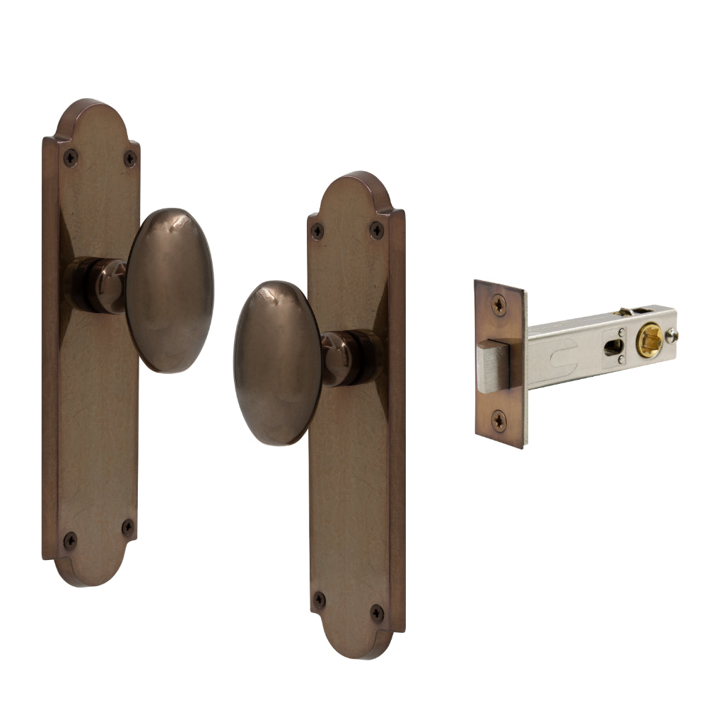 Oval Knob Plate Passage in Antique Bronze