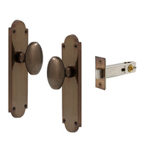 Oval Knob Plate Passage in Antique Bronze